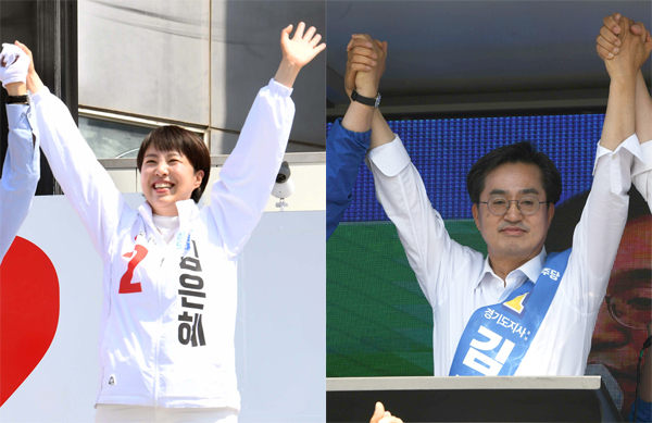 김은혜 국민의힘 경기도지사 후보가 31일 오후 오산시 롯데마트 사거리에서 시민들의 환호에 화답하고 있다(왼쪽).김동연 더불어민주당 경기도지사 후보가 31일 오후 안산 상록수역 광장에서 시민들의 환호에 화답하고 있다. /홍승남 기자